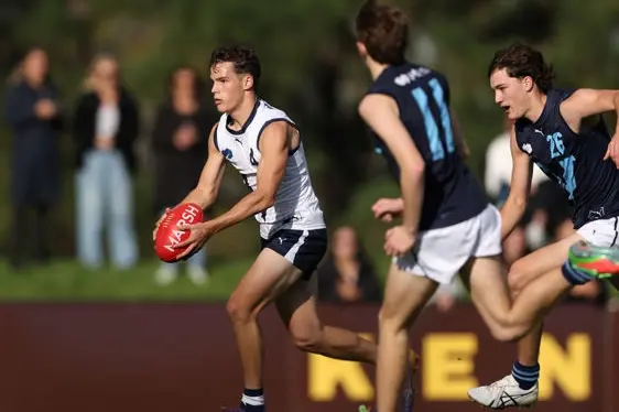 <p>CLASSY OPERATOR: Wangaratta\\'s Lenny Sims kicked two goals and had 19 touches in Vic Country\\'s 48-point win over Vic Metro in the opening round of the National Under 16 Development Championships. PHOTO: Rob Lawson/AFL Photos</p>\\n