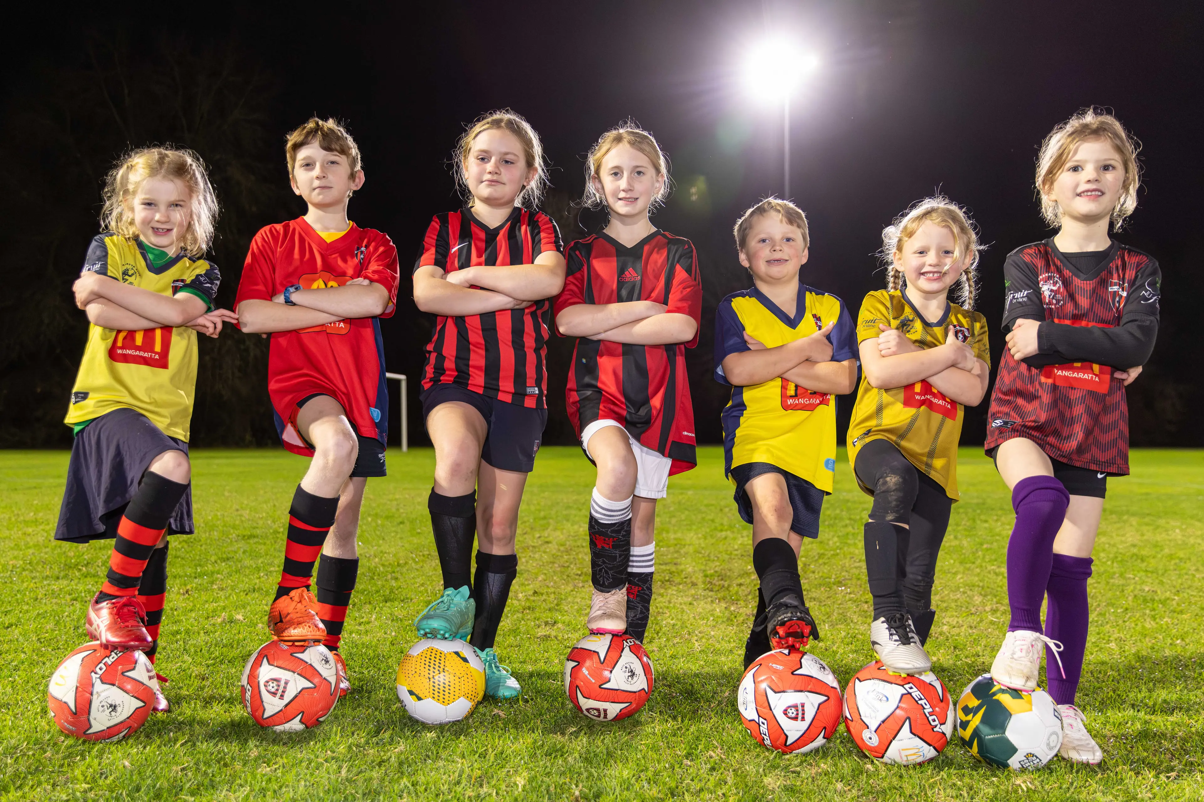 <p>BIG NIGHT: Wangaratta City Football Club MiniRoos, including (from left) Ella and Liam Peiper, Pia Solimo, Pipes Bell, James and Millie Thomas and Isabelle McGuire, were player mascots for the Matildas and Mexican national teams at their second international friendly match in Sydney this week. PHOTO: Marc Bongers</p>\\n