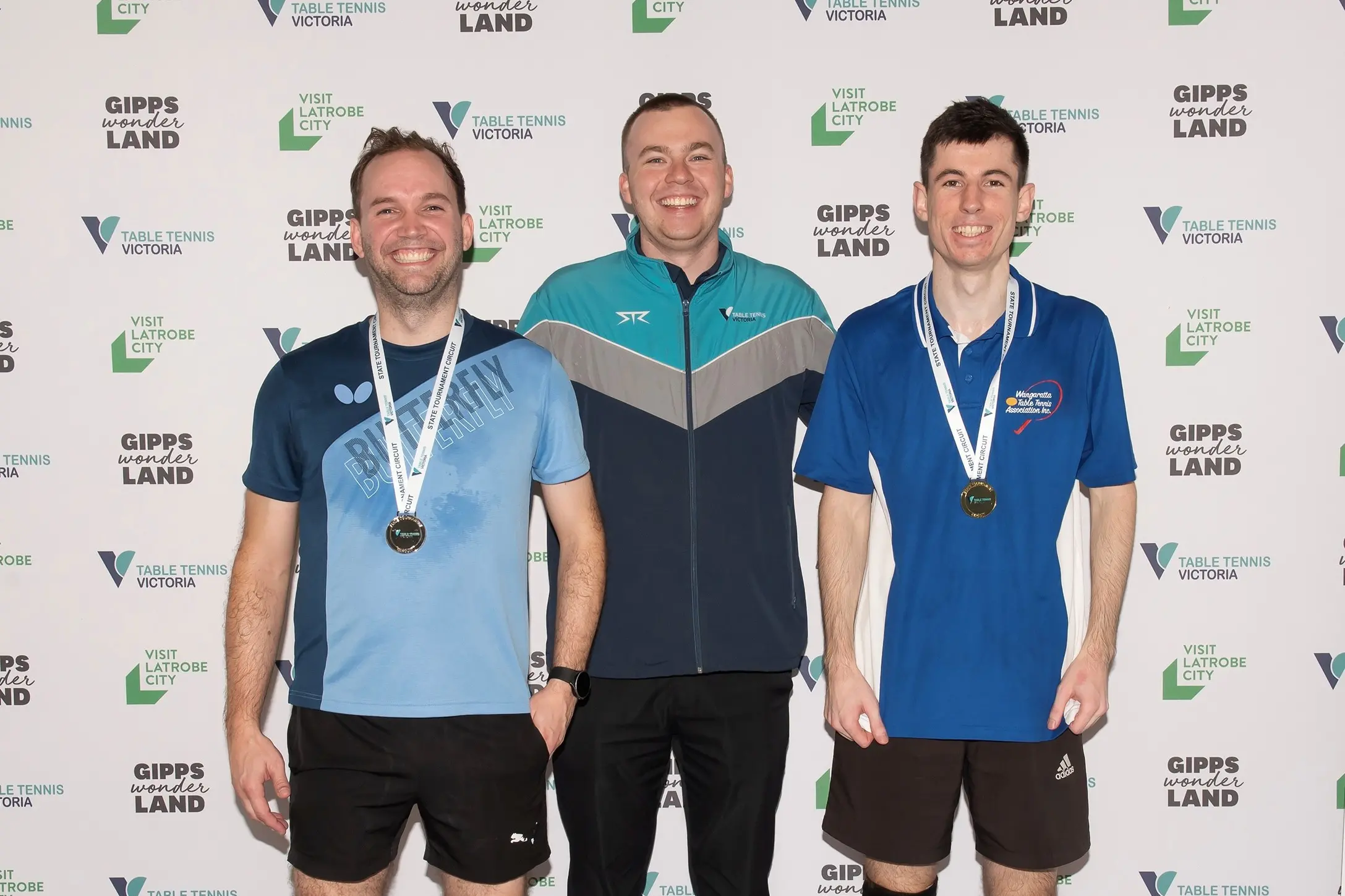 <p>BEST OF THE LOT: Vic Country Championships B Division Singles winner (right) Andrew Lindner, r/up (left) Andrew Tegelaers, and (centre) TTV presenter Noah Newnham. PHOTO: JJ\\u2019s Photography</p>\\n