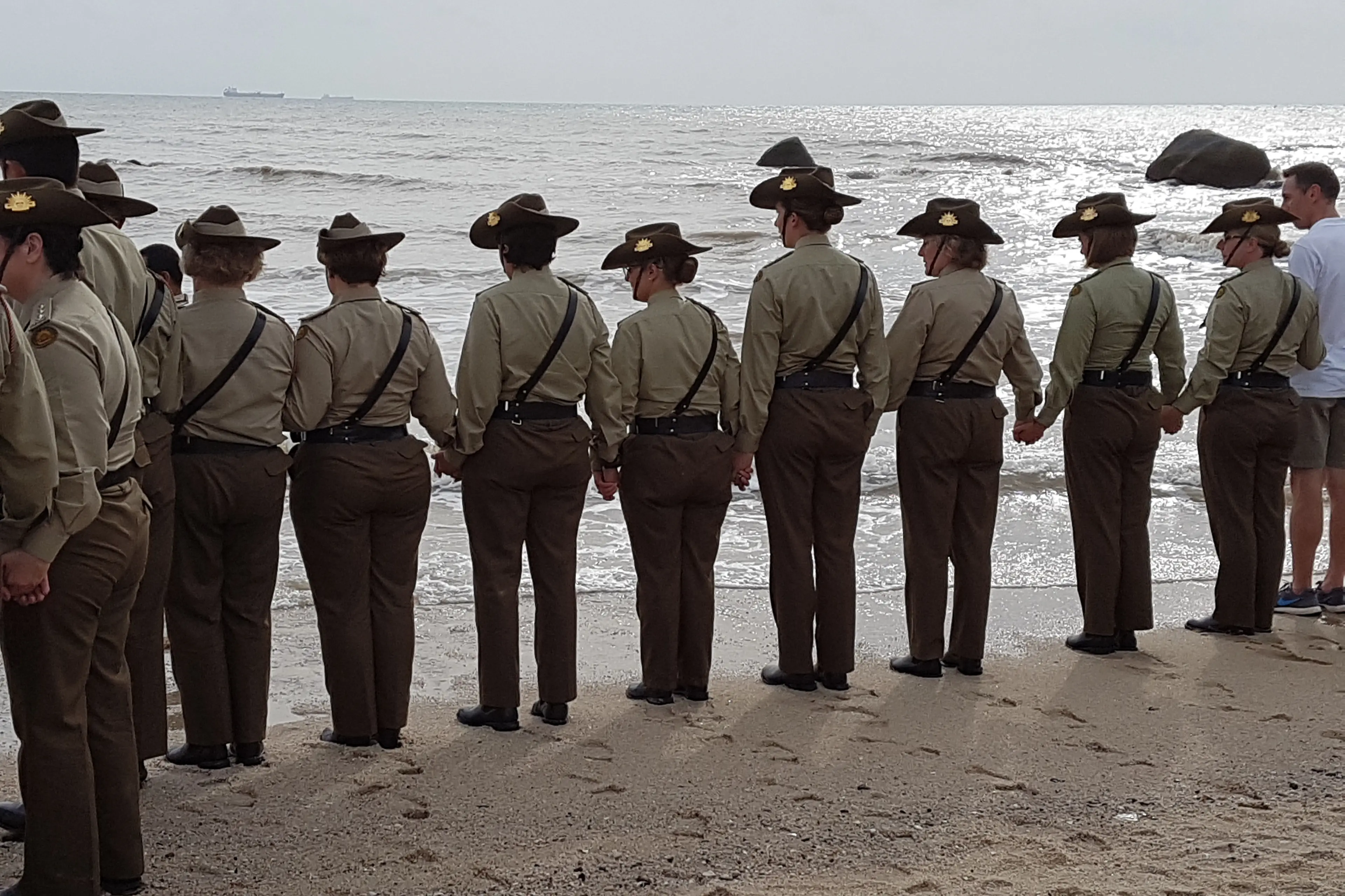 <p>Australian Army Nurses holding hands at water\\'s edge, Radji beach 2017 where Australian Army nurses held hands as they were shot by the Japanese</p>\\n