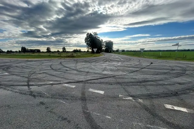 <p>RUBBER MARKS: Police are investigating reported hoon driving at the Wangaratta-Eldorado Road and Carraragamumgee Estate Road intersection on Saturday night. PHOTOS: Victoria Police</p>\\n