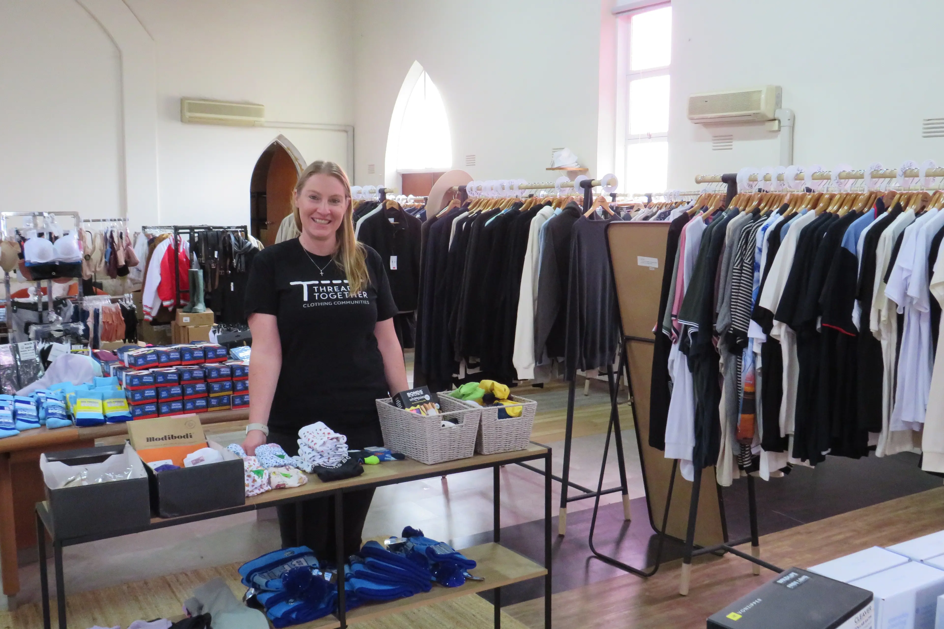 <p>SUPPORTING LOCALS: Grace Ferguson at the Wangaratta Baptist Clothing Hub which will benefit from an Australia Post \\'People of Post grant\\'. </p>\\n