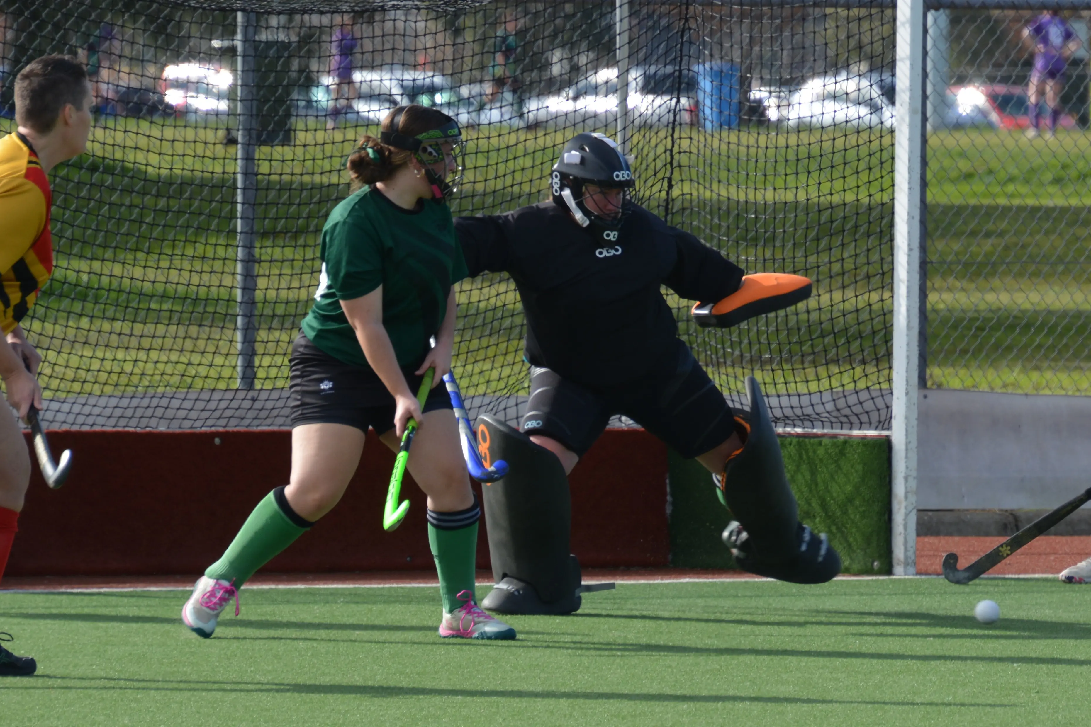 <p>TEAM DEFENCE: Defender Charlotte Bongers and goalie Meg Buller work to keep out a short corner for the division two women Dragons on Sunday. PHOTO: Phil Barnden</p>\\n