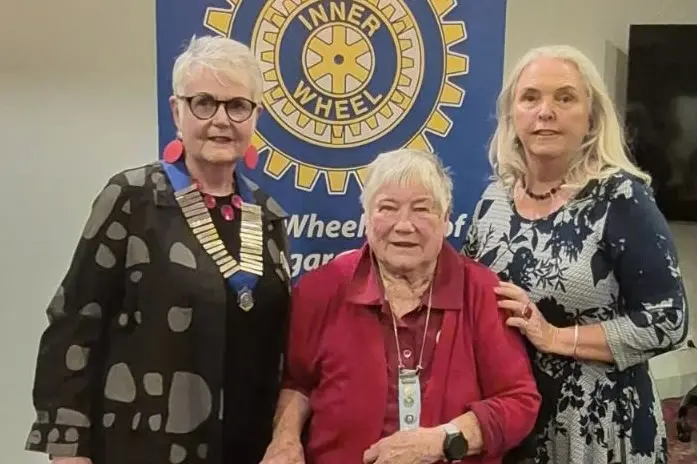 <p>SUPPORTIVE GROUP: Incoming president Karen Fenn, longtime member Patti Stafford, and outgoing president Dale King at the changeover dinner.</p>\\n