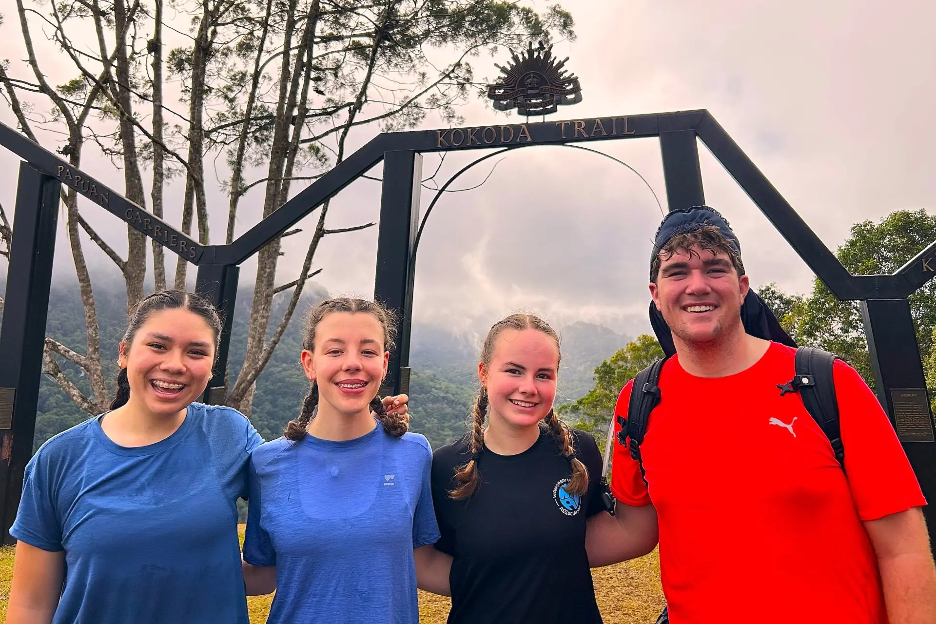 <p>FINISH LINE: Angela Keenan, Beth Meisinger, Fern Tucker and Cooper Clark at the end of the trek at Owers corner. </p>\\n