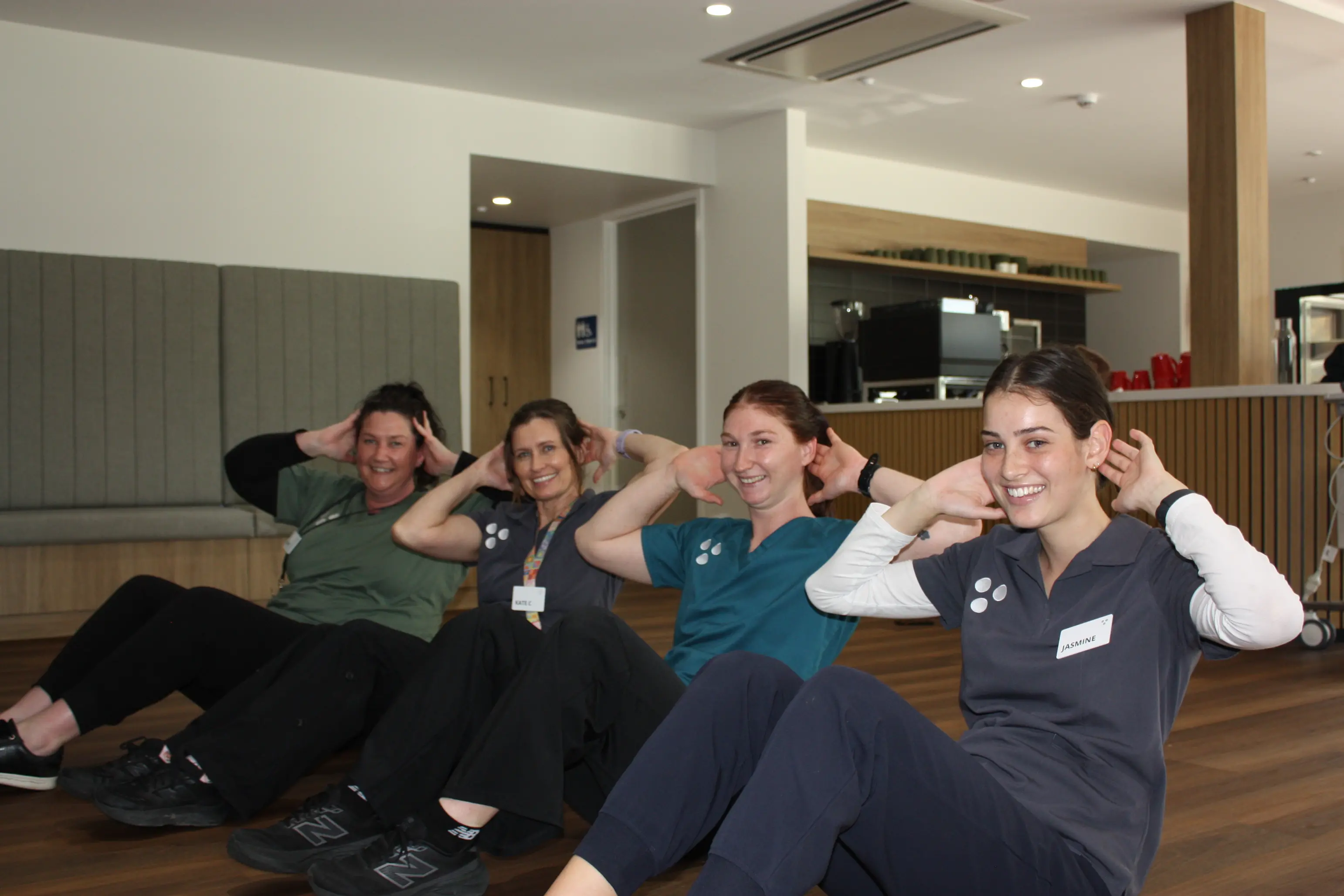 <p>CRUNCHING CORES FOR A CAUSE: St Catherine\\'s staff Kate McKay (left), Kate Crispo, Mel Cooper and Jasmine Scott helped raise over $1500 for dementia care and awareness by completing crunches. PHOTO: Grace Fredsberg</p>\\n