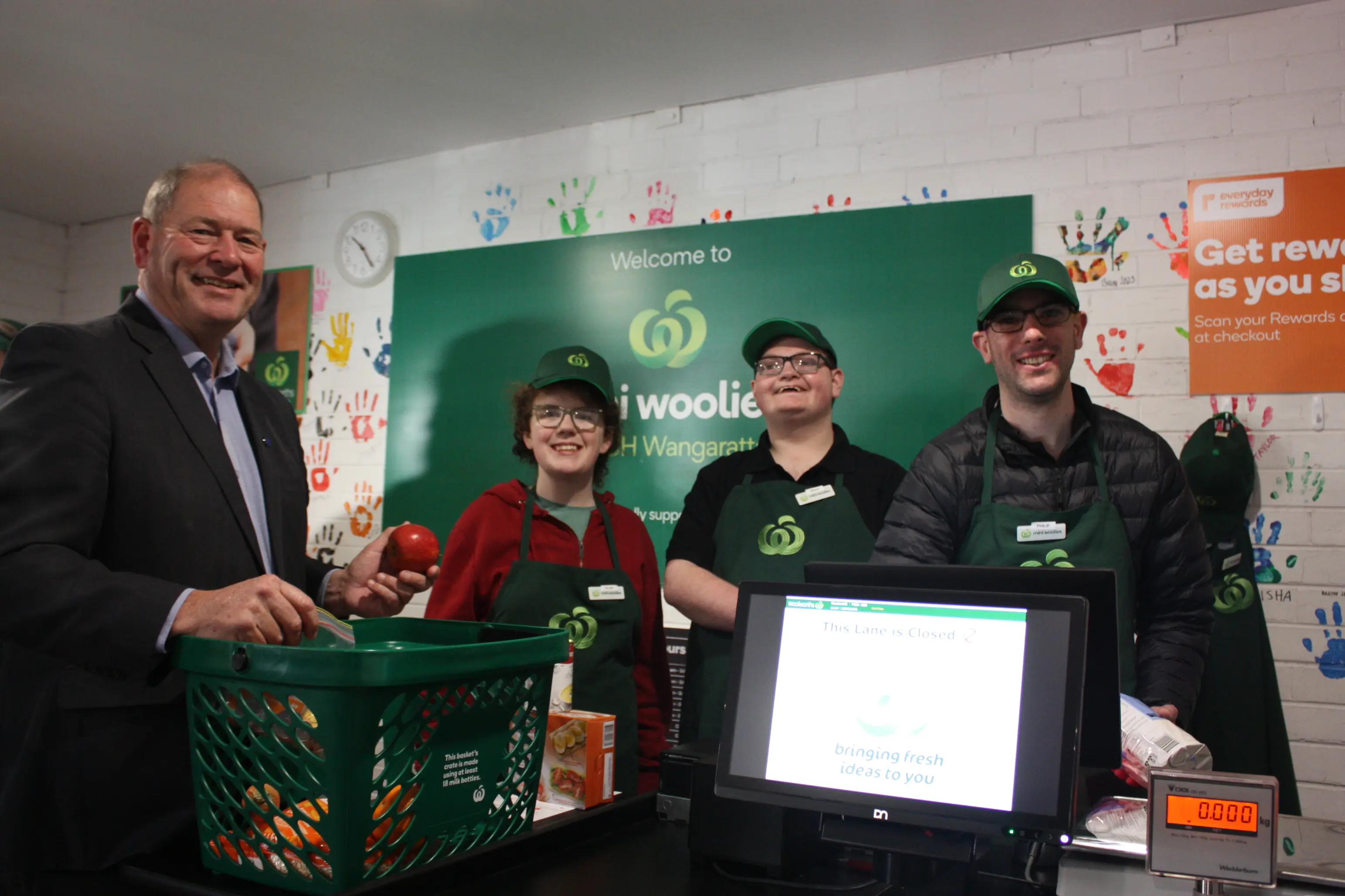 <p>QUALITY SERVICE: VMCH participants Eliza Tilly (second from left), Aiden Fallon and Phillip Neer helped Nationals MP for Ovens Valley Tim McCurdy check out his groceries during the Mini Woolies supermarket simulation. PHOTOS: Grace Fredsberg</p>\\n