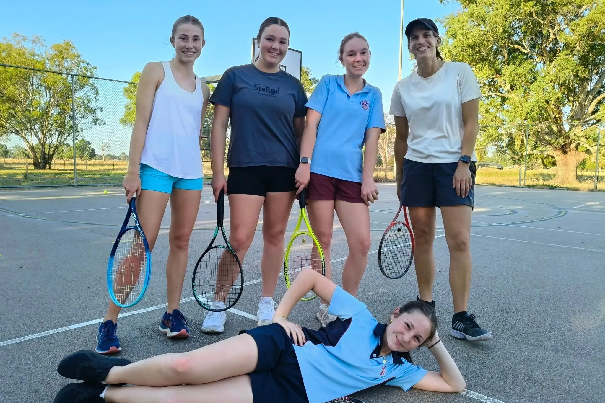 <p>TRY TENNIS: Girls aged 12-18 like (from left) Ava Williamson, Carla Flanigan, Mia Younger and (front) Tilly Pickett, pictured with (far right) tennis coach Maggie Snowdon, are encouraged to give tennis a go at six-week program hosted by the Moyhu Tennis Club.</p>\\n