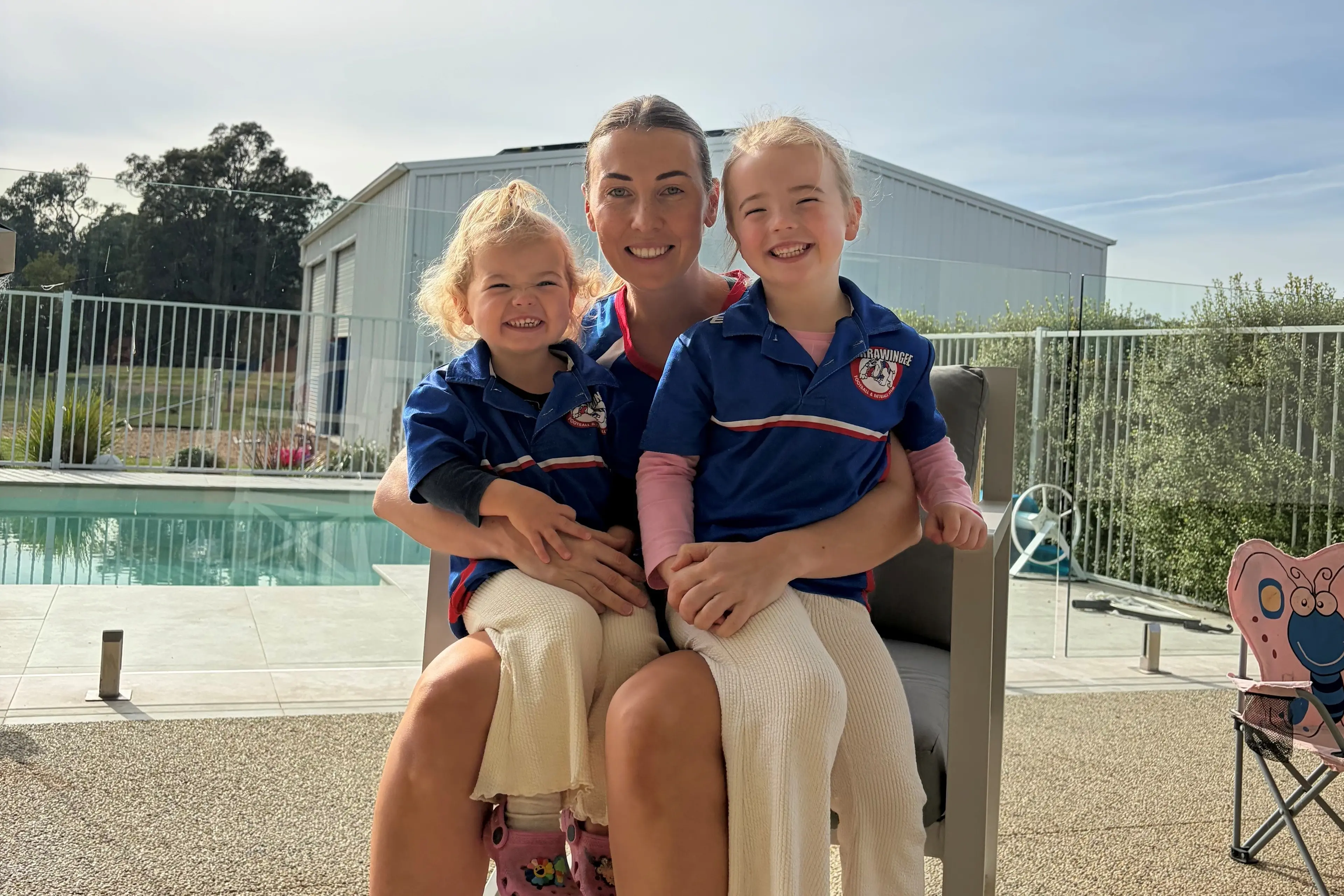 <p>A DAY OUT: Paige Warner with daughters Rylie (2) and Wren (4) will be celebrating Paige\\'s 250th game with Tarrawingee when they take on Goorambat this Saturday</p>\\n