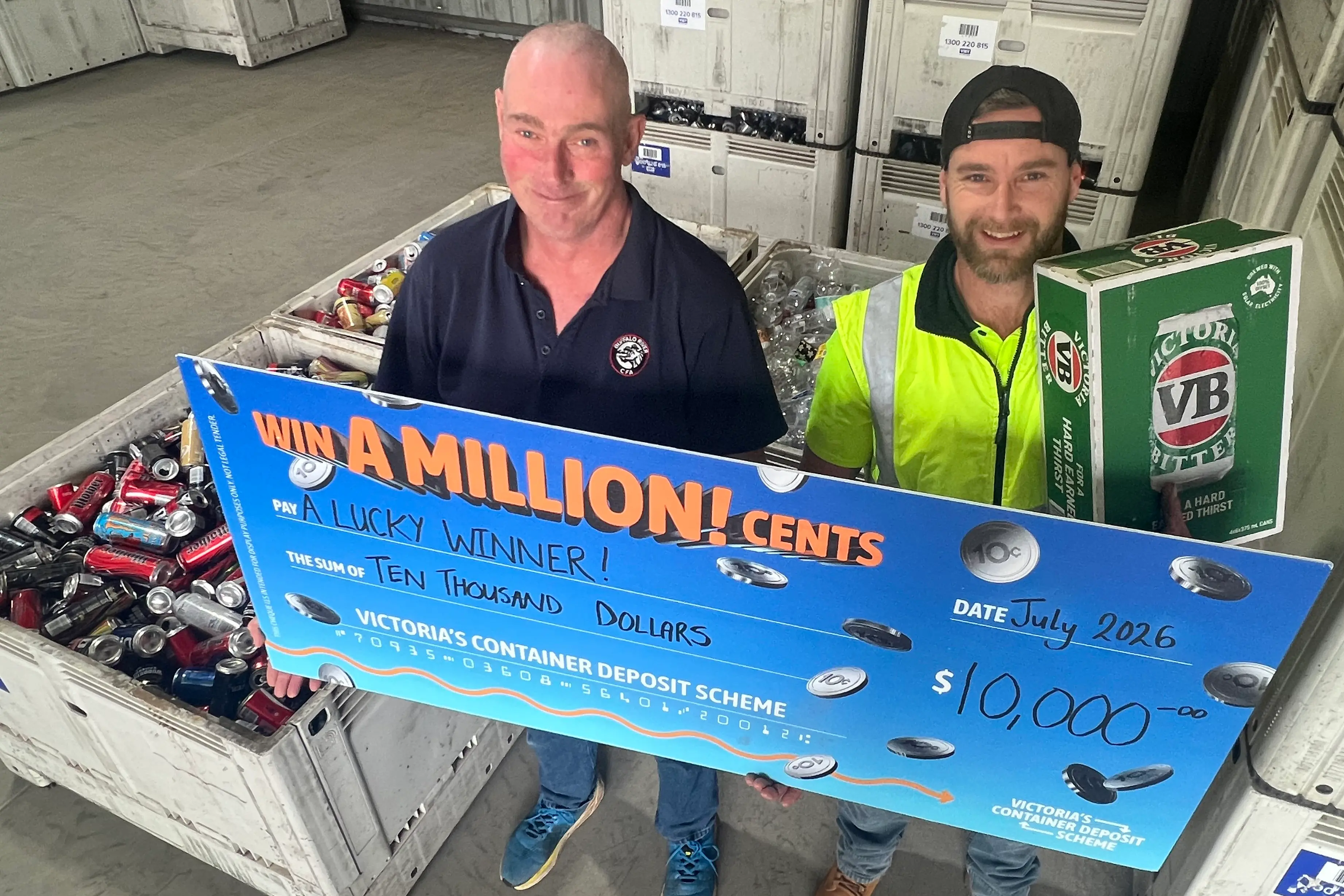 <p>WINNER: Trevor McKibbin (left) won $10,000 by recycling his bottles and cans at the Victoria Container Deposit Scheme\\'s Wangaratta depot in Newman Street. The win also delivered staff members, including Nathan Cook, with a slab of VB. PHOTO: Jeff Zeuschner </p>\\n