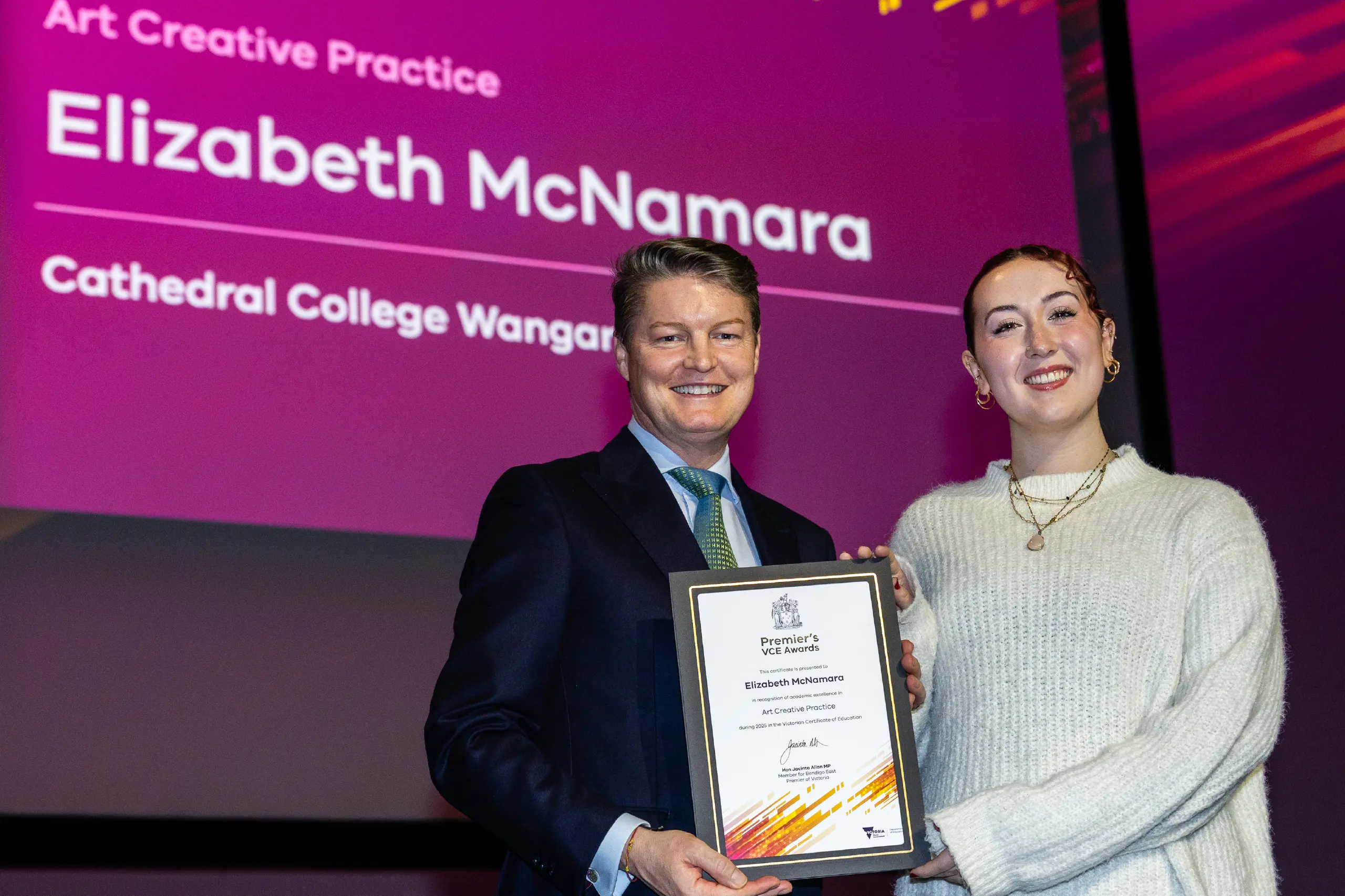 <p>HIGH ACHIEVER: Cathedral College alum Ellie McNamara receives her Premier\\'s VCE Study Award for Art Creative Practice from Ben Carroll at last week\\'s awards night in Melbourne.</p>\\n