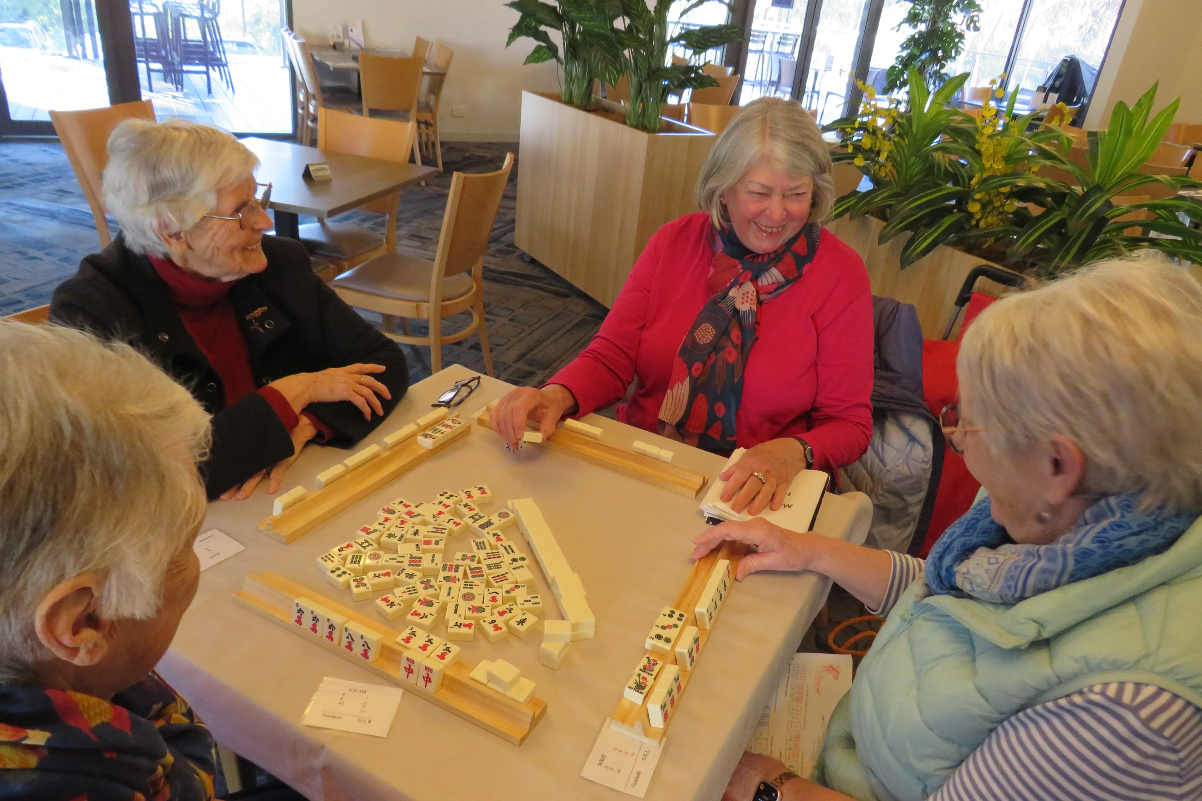 <p>FRIENDLY GAME: Ann Lindsey, Ruth McLay, Lou Pope and Jan Vincent enjoy a game of mahjong at the Wangaratta RSL on Thursday morning. The tile-based game of skill, strategy and luck originated in 19th century China, and has since spread throughout the world. It is played at the Wangaratta RSL each Thursday from 11am, with beginners welcome. PHOTO: Simone Kerwin </p>\\n