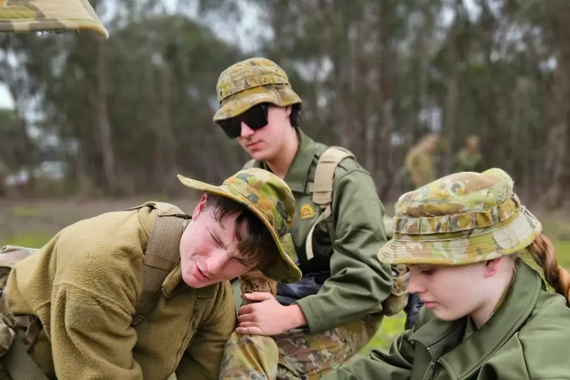 <p>LEARNING LIFE SKILLS: (From left) Cadet Levi Charles, Cadet Mitchell Crowhurst, and Cadet Violet Busk from Wangaratta\\'s 33 Army Cadet Unit practise their first aid skills during the Quick Thinking Exercise (QTE) at the Battalion Super Weekend in June.</p>\\n