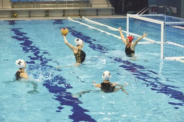<p>TEAM FUN: Water polo is a fast-paced team sport that combines swimming, ball skills, and teamwork.</p>\\n
