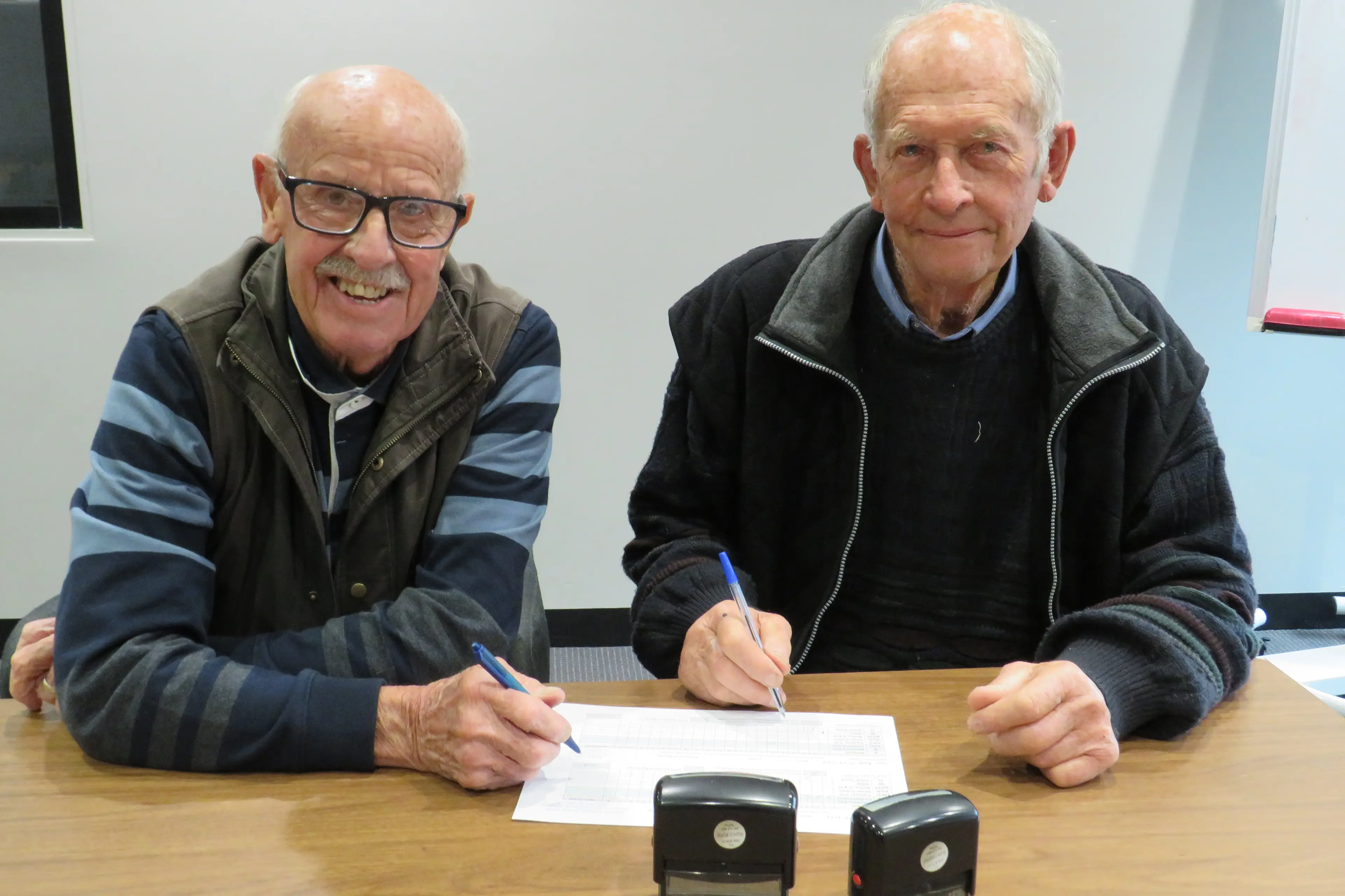 <p>HAPPY TO HELP: Ron Webb and Robert Gibb are among the local Justices of the Peace who support the document-signing service available at the Wangaratta Library on Wednesday and Friday mornings and Thursday evenings.  They would love to see more local JPs join the roster.  PHOTO: Simone Kerwin</p>\\n