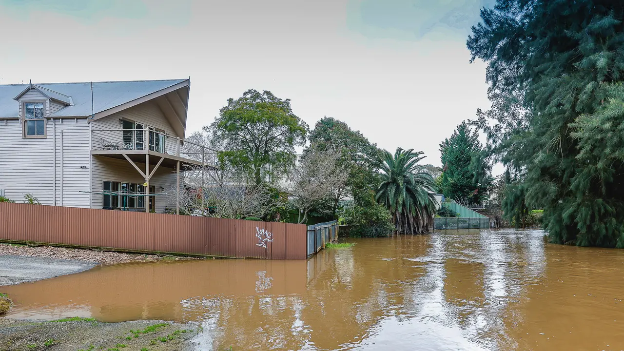 Rivers slowly recede from record drenching