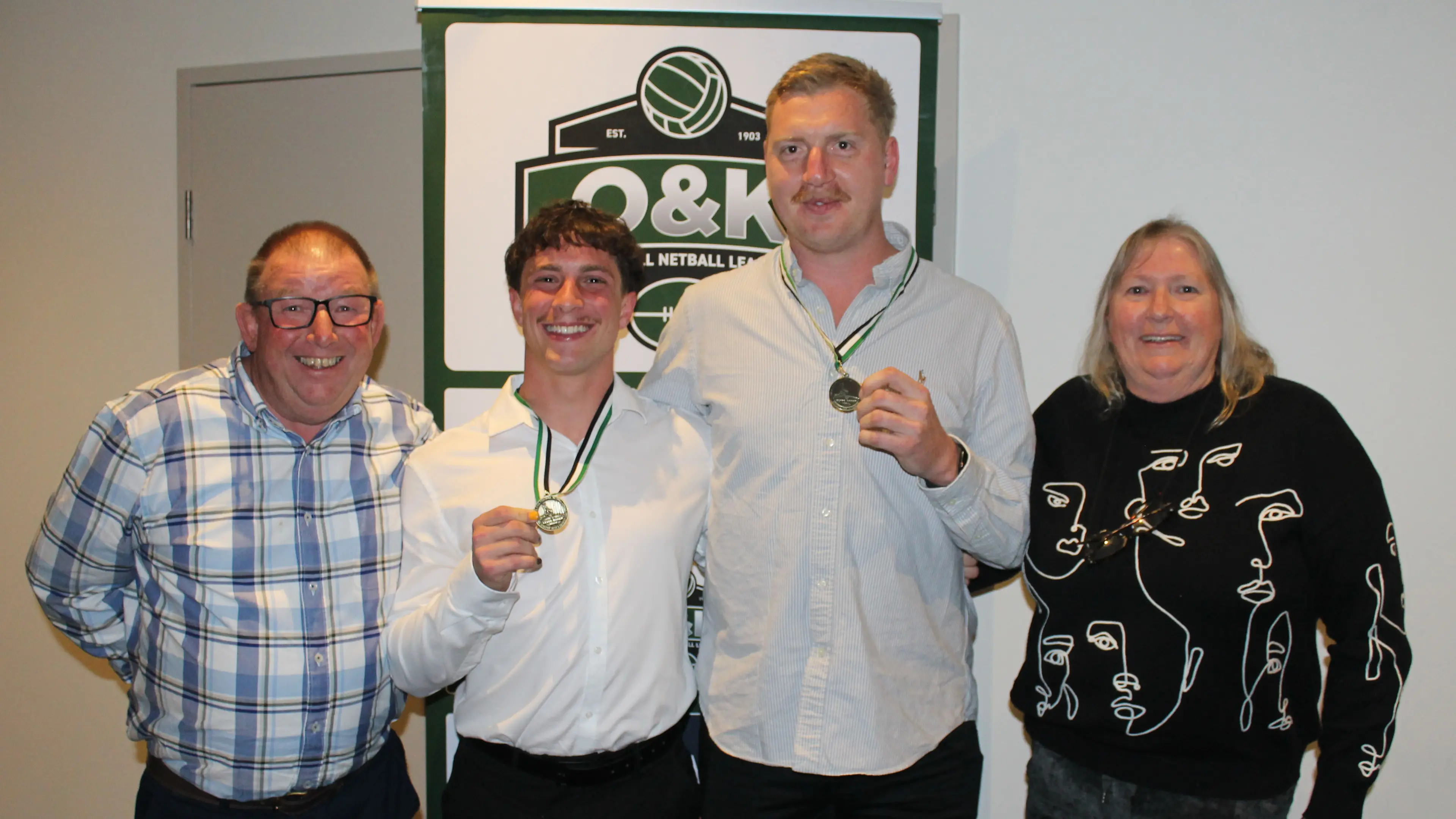 Crawford, Sartore share Clyde Baker Medal