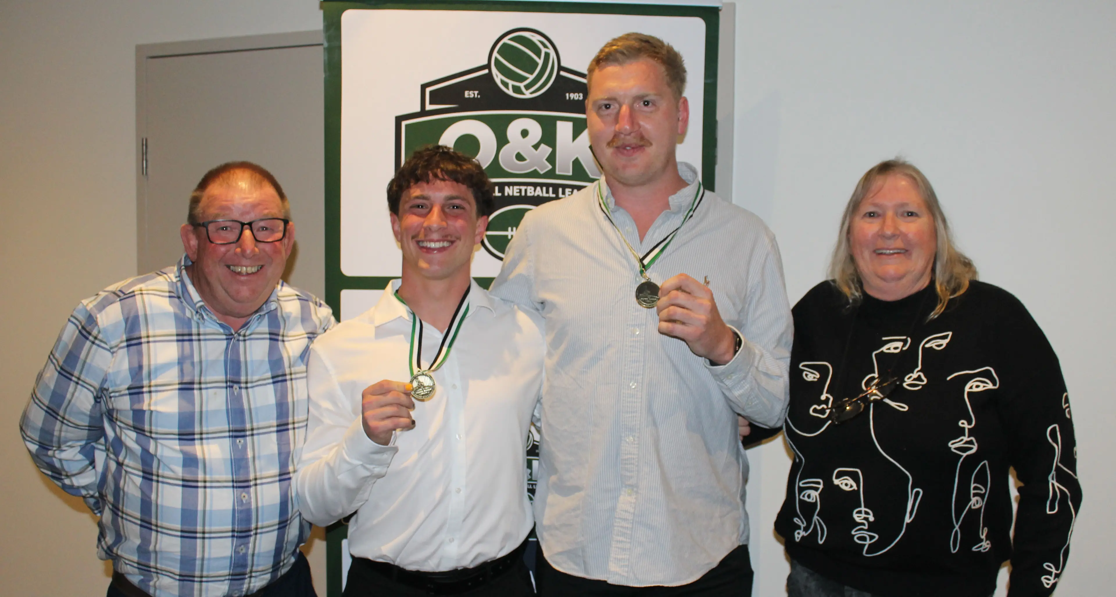Crawford, Sartore share Clyde Baker Medal