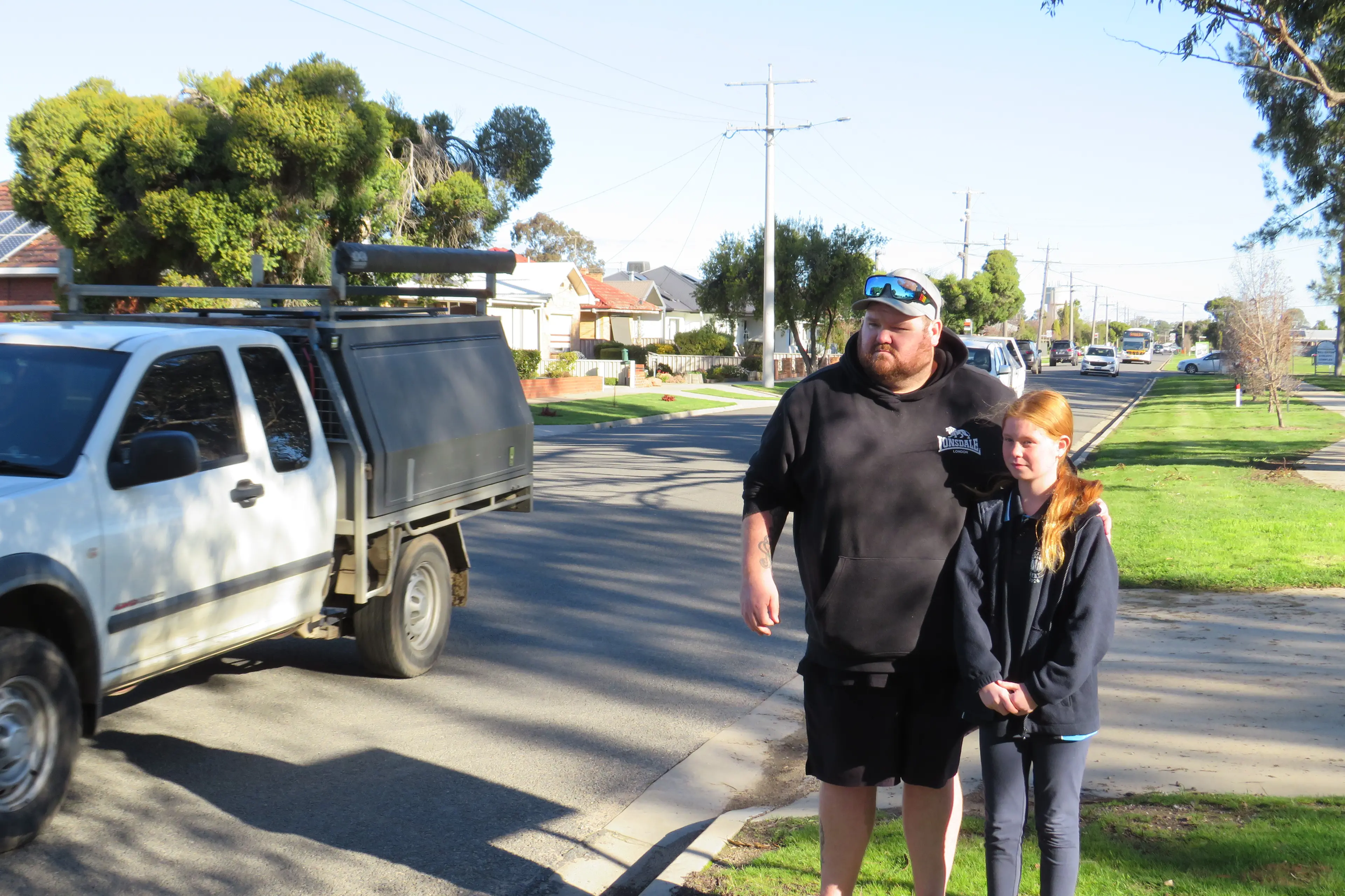 <p>BUSY SPOT: Peter Skinner and daughter Amelia Anderson-Skinner watch the steady post-school traffic close to the Appin Street-Irwin Avenue intersection, where Mr Skinner had hoped council would install a priority pedestrian crossing rather than the planned kerb outstands. PHOTO: Simone Kerwin </p>\\n