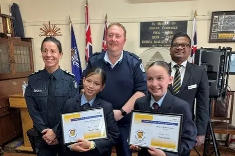 <p>STRONG VOICES: Junior Public Speaking Competition regional final judges (back, from left); Leading Senior Constable Chris De Ciero, Benalla Fire Brigade captain Charlie Sexton and Benalla councillor Puna Gunaratne pictured with the competition winners Hypatia Fidge (Cathedral College, grade 5/6) and Isabelle Pilcher (St Mary\\u2019s Primary School Corowa), who will proceed to the district finals this Sunday. </p>\\n