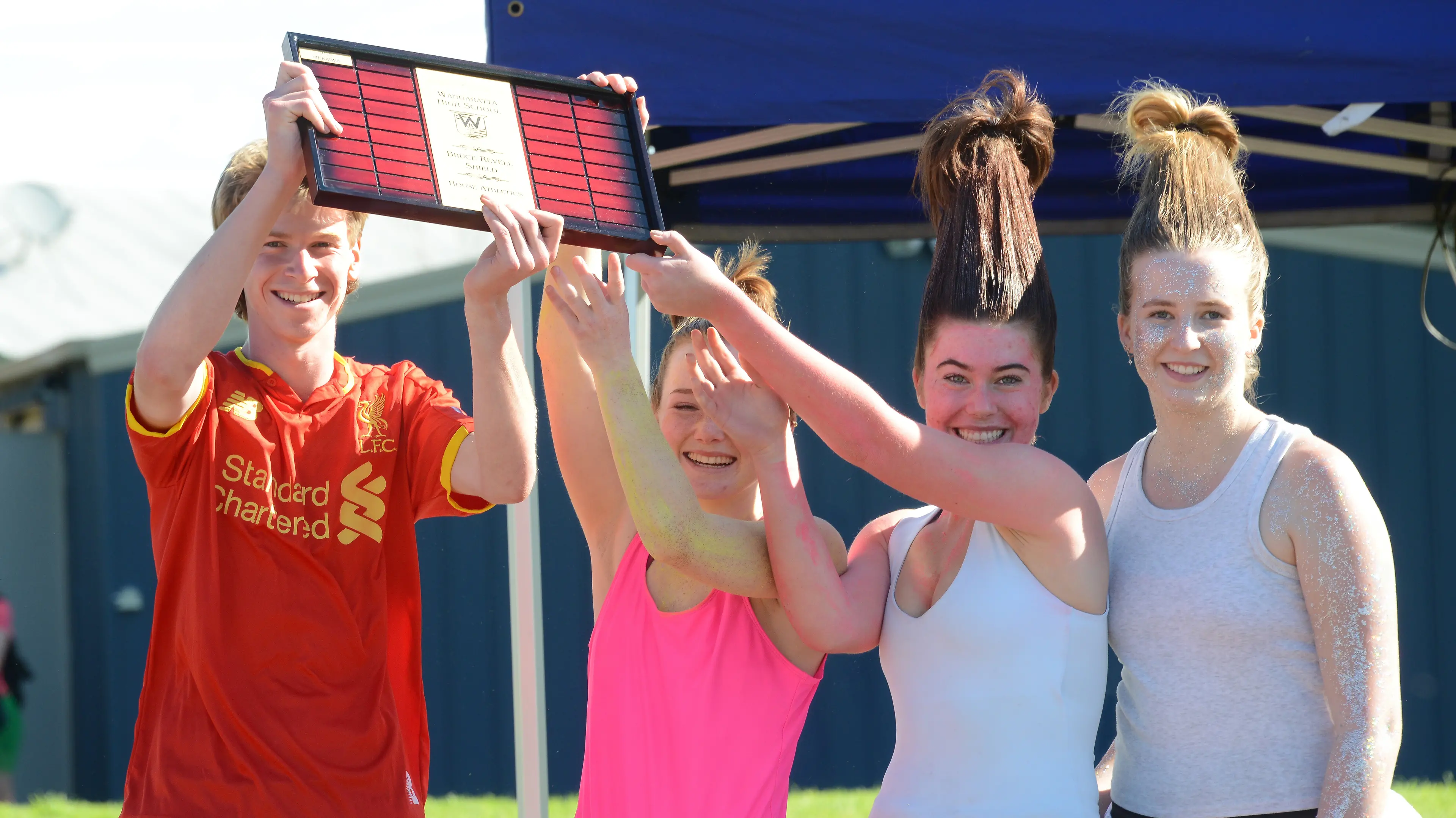 Wareena lifts the shield at WHS aths carnival