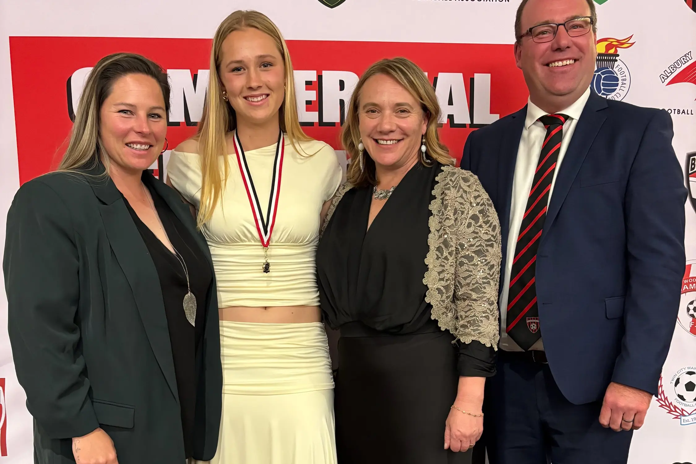 <p>SIMPLY THE BEST: Division two women star player Isabelle Christison (second from left)  with coaches Kat Carmody (left), Kristy Mellor, and club president Brett Aggenbach. PHOTO: Mel Aggenbach</p>\\n