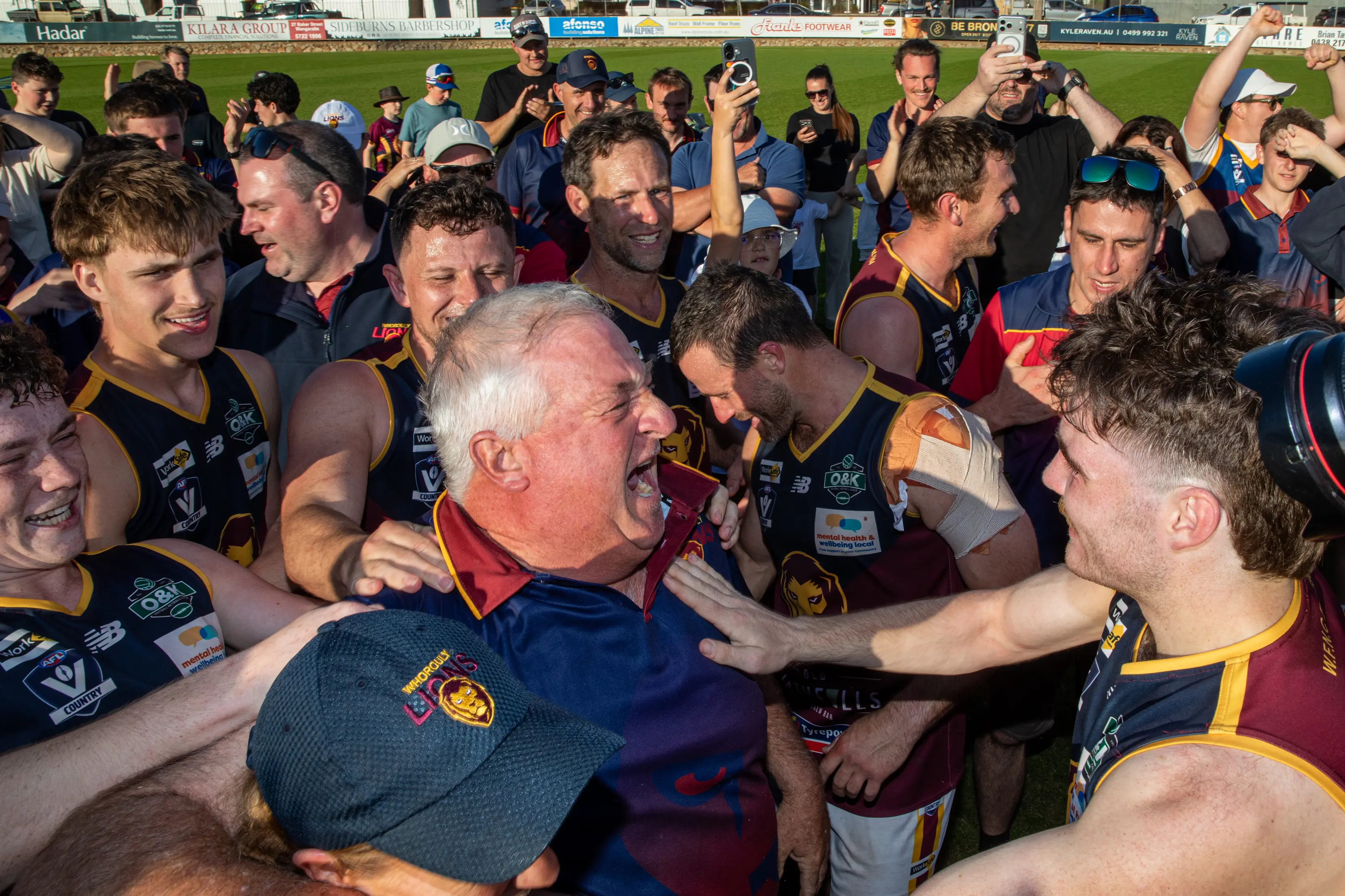 <p>WHAT A WIN: Whorouly FNC president Eddie Costenaro among the premiership celebrations of the senior football side, who broke a 19-year drought with their eight point win on Saturday. PHOTOS: Marc Bongers</p>\\n
