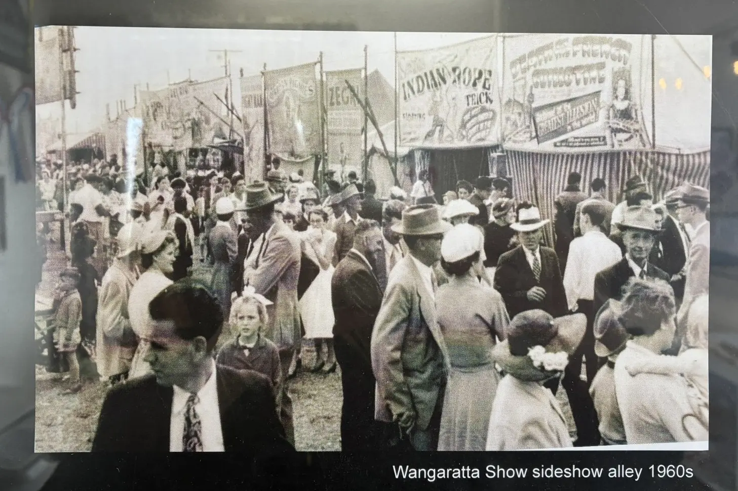 <p>BLAST FROM THE PAST: Crowds enjoying the sideshow alley at the Wangaratta Show in the 1960s. </p>\\n
