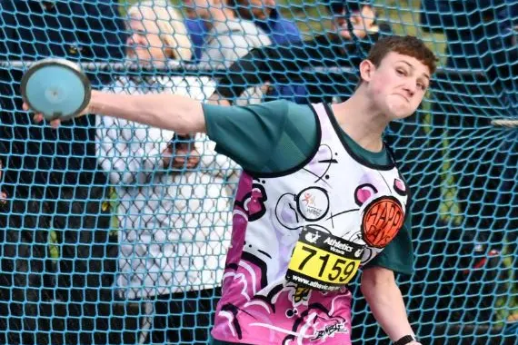 <p>Corry Unthank in action in his discus event, which saw him finish first on the way to state qualification.</p>\\n