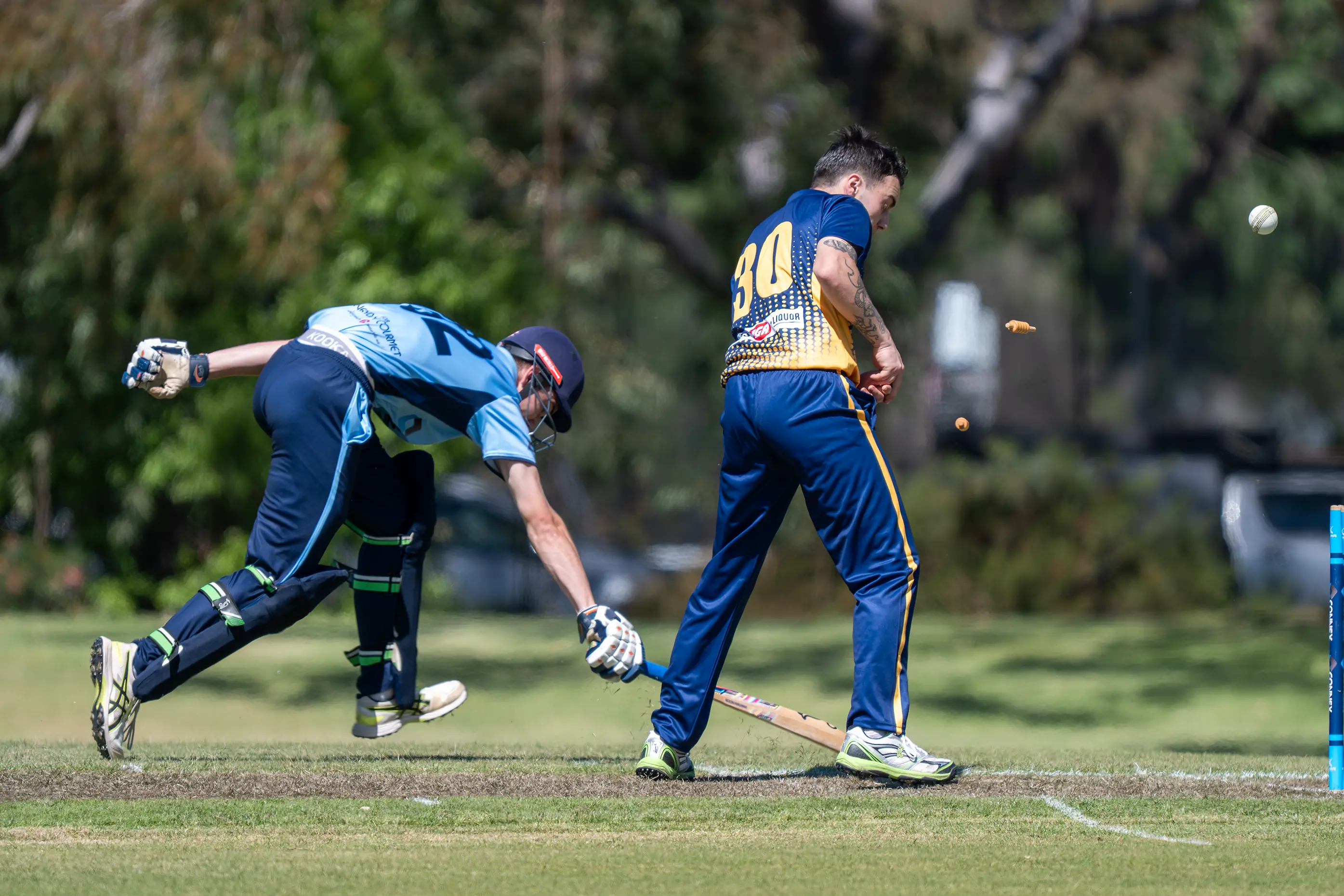 <p>DIVING EFFORT: Hugh Spring reaches out to make it into his crease, but not before the bails went flying. PHOTOS: Melissa Beattie</p>\\n