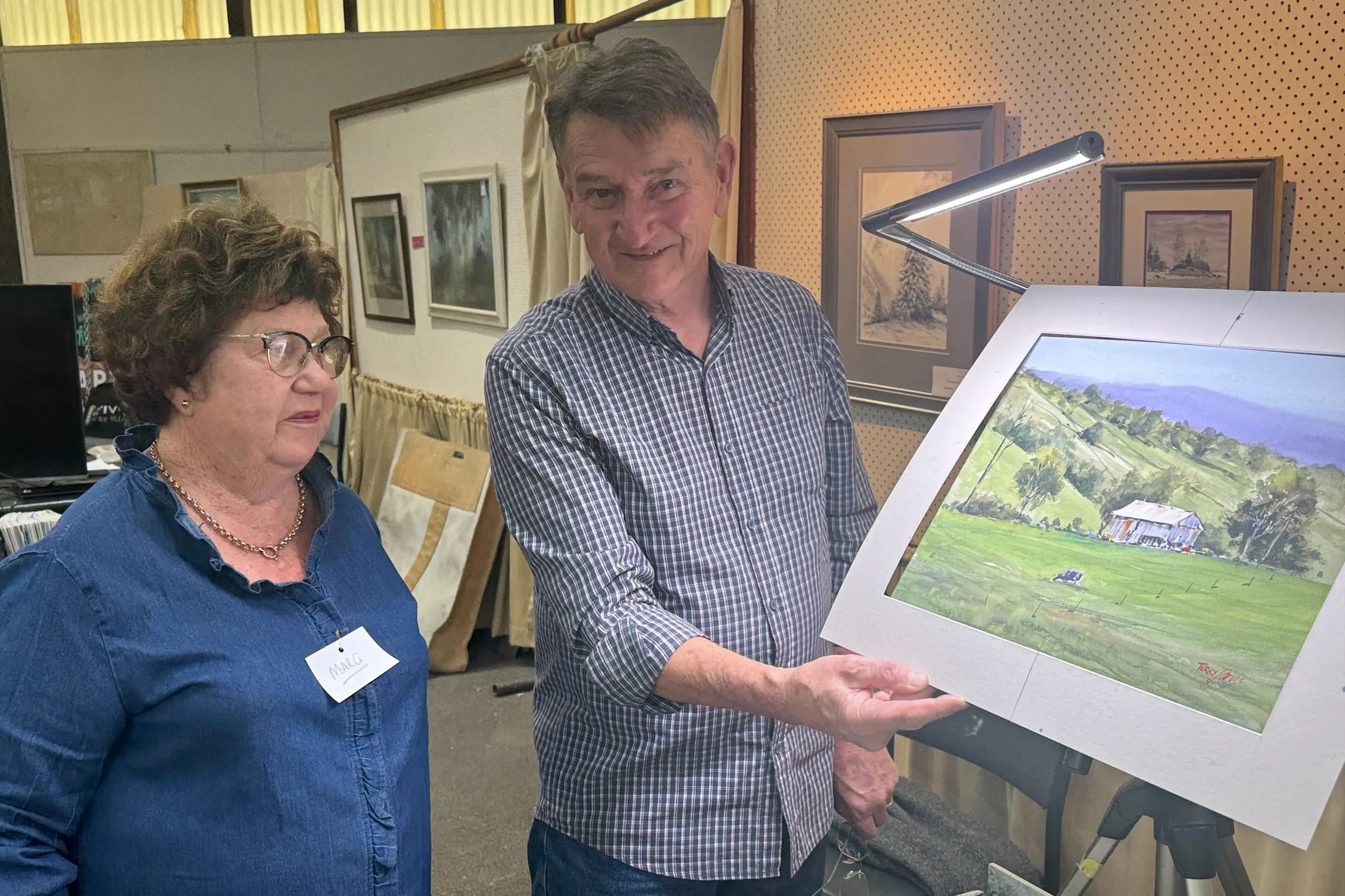 <p>EDUCATIONAL EXPERIENCE: Marg Scott and watercolour artist Terry Jarvis with Terry\\u2019s completed landscape during Wangaratta Artists Society\\u2019s workshop on 17\\u201318 October 2026.</p>\\n