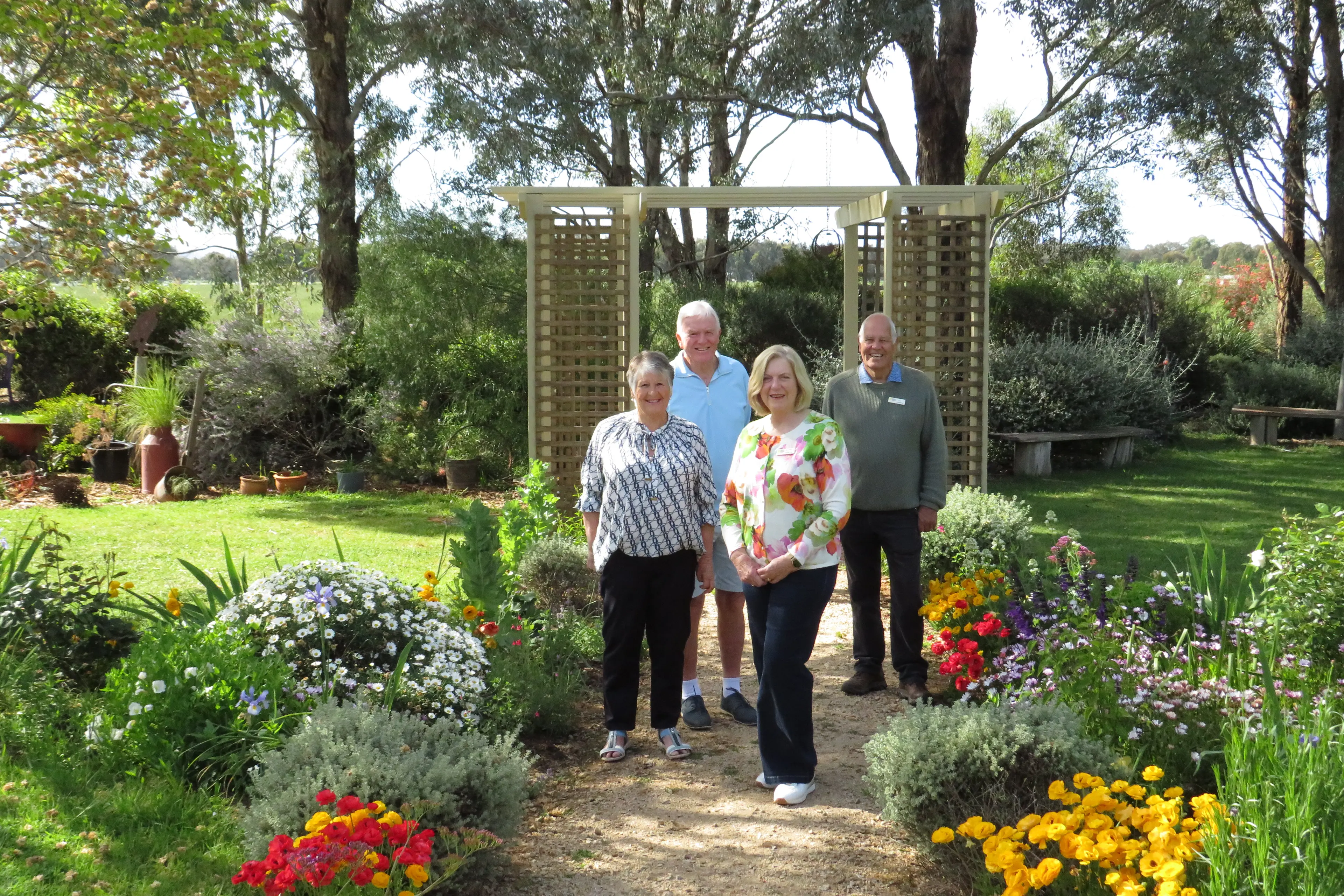 <p>GARDEN IN ALL ITS GLORY: Rob and Julie Lamond (left) will open up their beautiful Tarrawingee garden as it puts on its spring face, as they and fellow Wangaratta Cancer Council Victoria Volunteer Group members Heather and Ray Champlin (right) host a fundraising open garden event on Sunday 8 November from 10am to 4pm. The garden is located at 434 Lyons Road, Tarrawingee, and admission will be $10 (children free), with cash preferred. Delicious refreshments of sandwiches, sausage rolls, cakes, and tea and coffee will be available, and all proceeds go directly to Cancer Council Victoria. PHOTO: Simone Kerwin</p>\\n