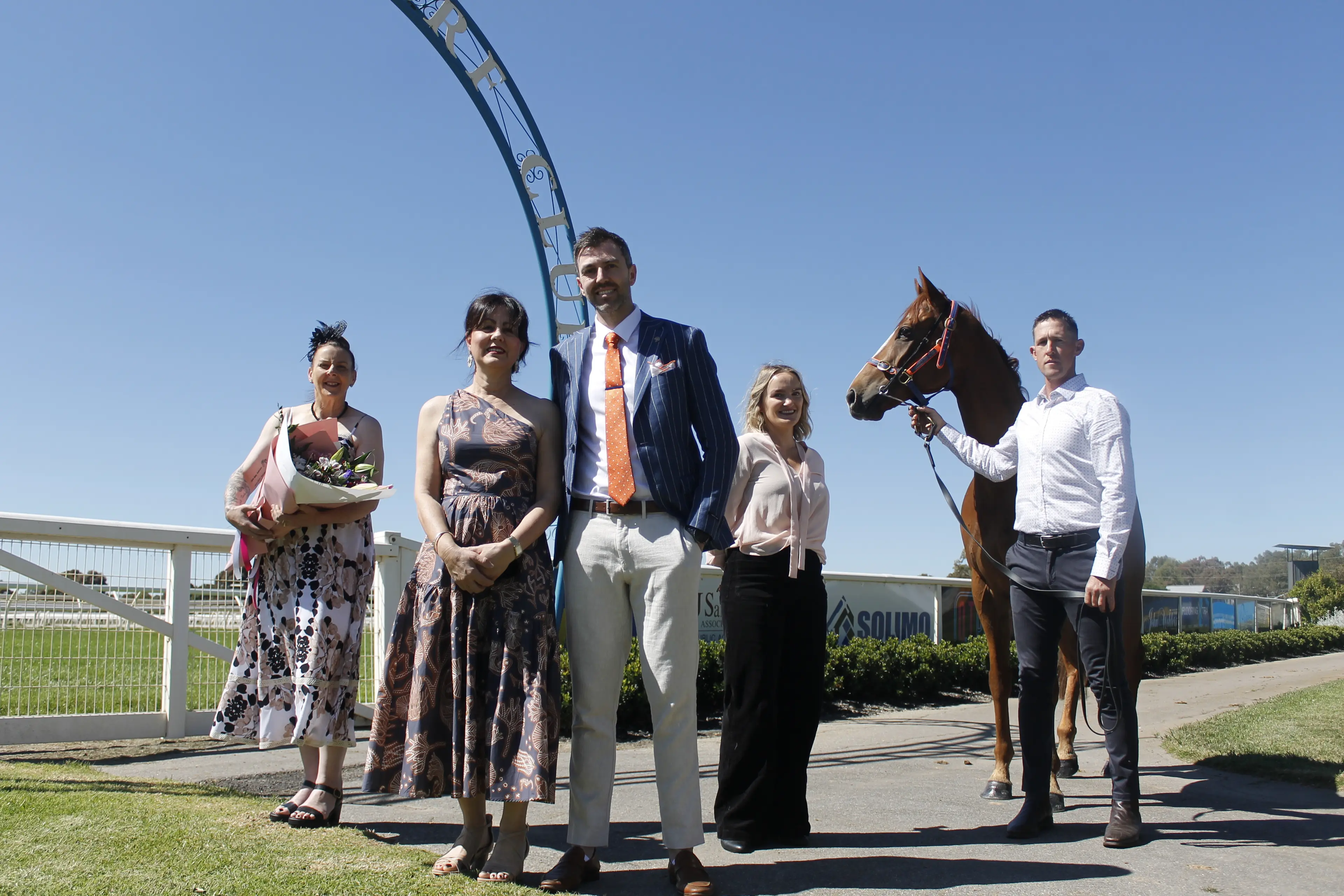 <p>SCENE IS SET: In just a few days, the Wangaratta Turf Club will come alive with the infectious energy of the Ovens Ford Melbourne Cup Day. Pictured are Mandie Miles (Hello Petals), Delfina Jiovannoni and AJ Southern (Judds=Men), Wangaratta Turf Club CEO Emma Merlo, who are joined by the ever commanding Before The War with Ledger Racing trainer Chris Ledger. PHOTO: Grace Fredsberg</p>\\n