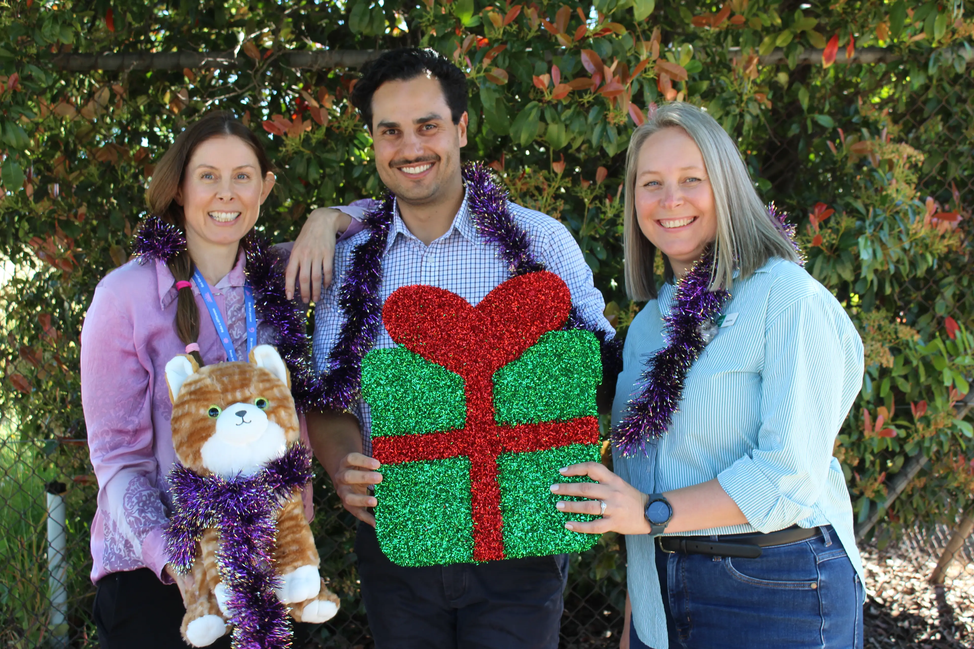 <p>IN THE SPIRIT OF GIVING: Staff from the three appeal partner organisations (from left) Alex Gardner (CAV), Peter Vakirtzis (UMFC) and Sandrine Ross (Gateway Health) encourage others to donate to the Give a Gift Appeal.</p>\\n